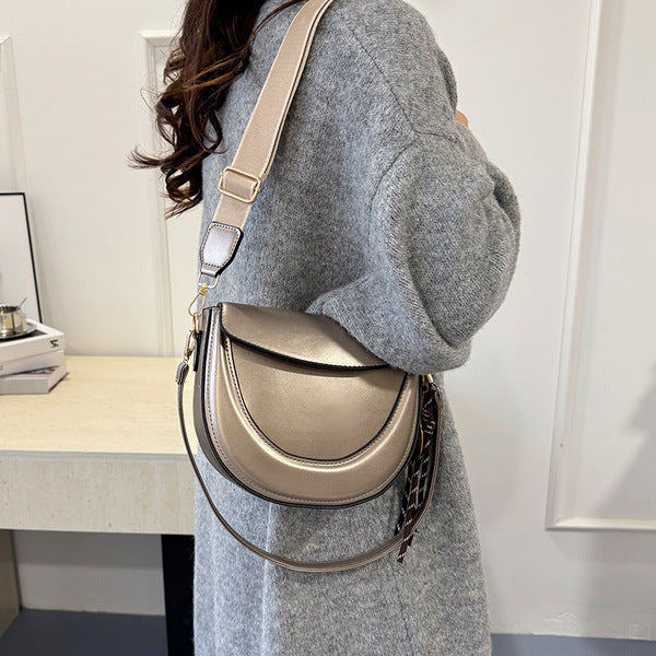 Curved Saddle Crossbody Bag with Dual Interchangeable Straps     ( Charm included )
