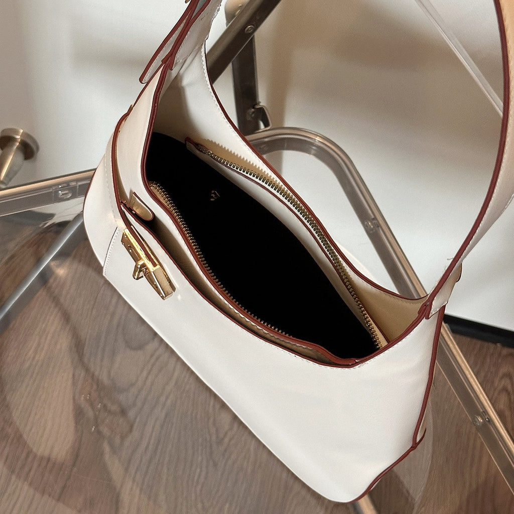 Minimalist Crescent Shoulder Bag with Buckle Accent and Adjustable Strap
