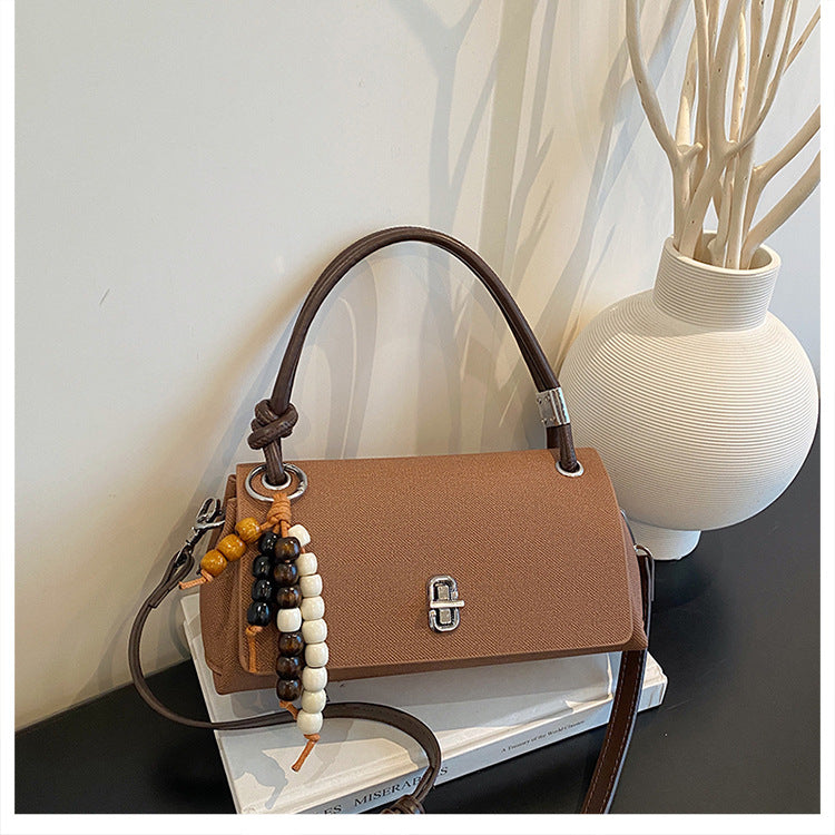 Structured Top-Handle Crossbody Bag with Pearl & Wood Beaded Charm