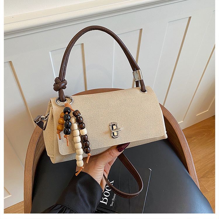 Structured Top-Handle Crossbody Bag with Pearl & Wood Beaded Charm
