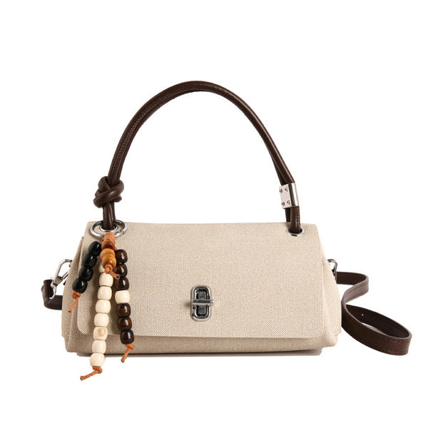 Structured Top-Handle Crossbody Bag with Pearl & Wood Beaded Charm