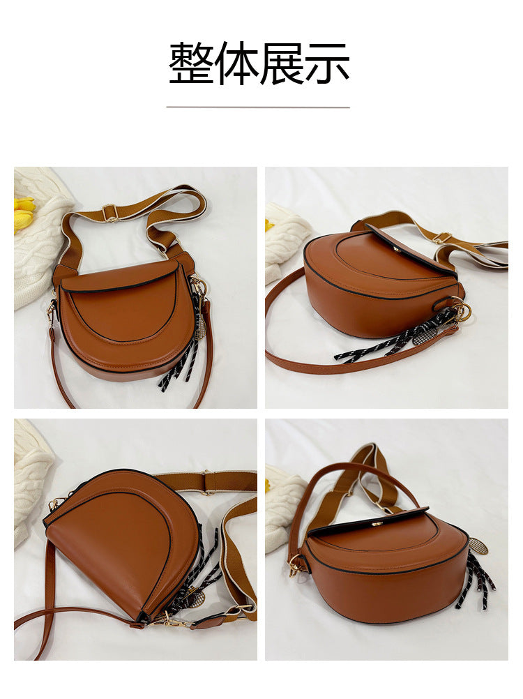 Curved Saddle Crossbody Bag with Dual Interchangeable Straps     ( Charm included )