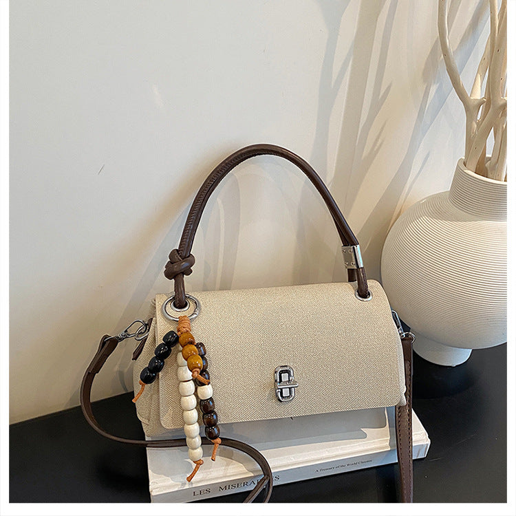 Structured Top-Handle Crossbody Bag with Pearl & Wood Beaded Charm