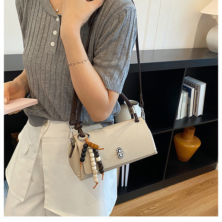 Structured Top-Handle Crossbody Bag with Pearl & Wood Beaded Charm