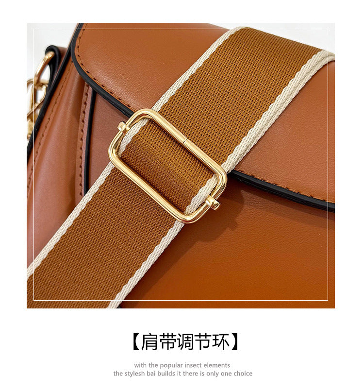 Curved Saddle Crossbody Bag with Dual Interchangeable Straps     ( Charm included )