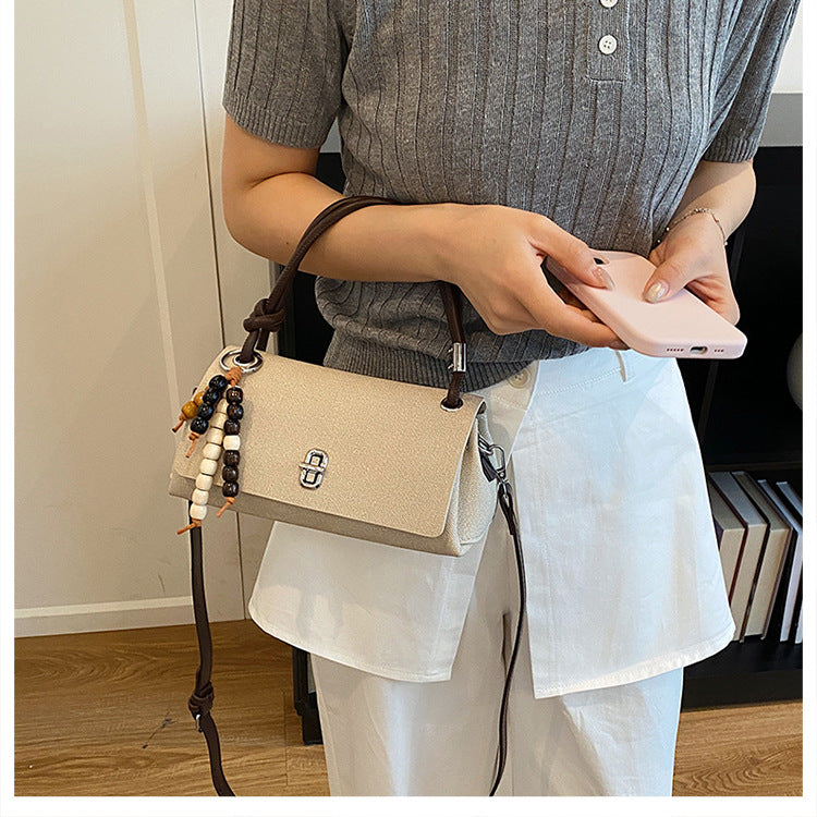 Structured Top-Handle Crossbody Bag with Pearl & Wood Beaded Charm