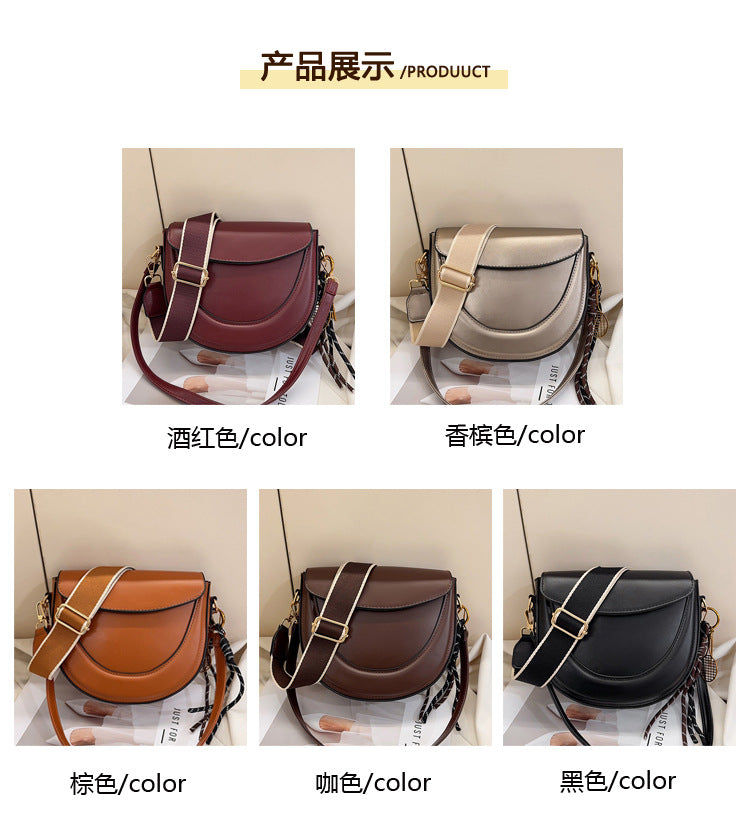 Curved Saddle Crossbody Bag with Dual Interchangeable Straps     ( Charm included )