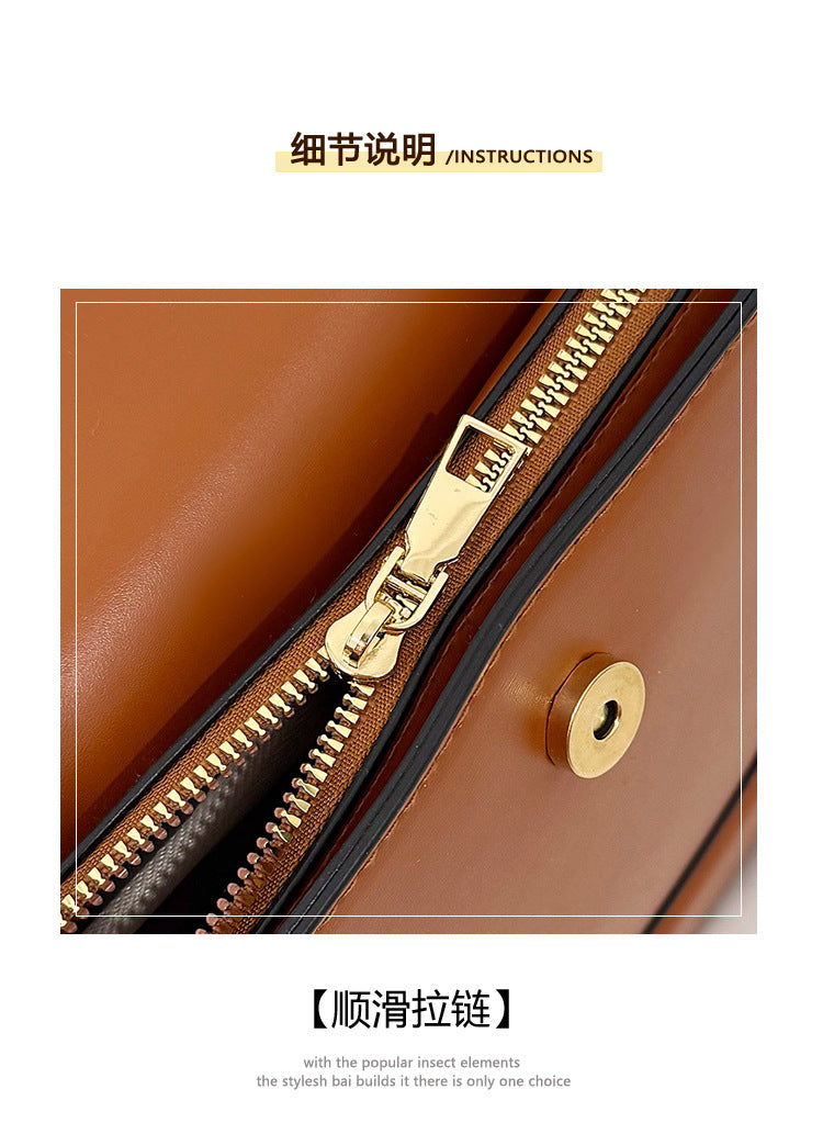 Curved Saddle Crossbody Bag with Dual Interchangeable Straps     ( Charm included )